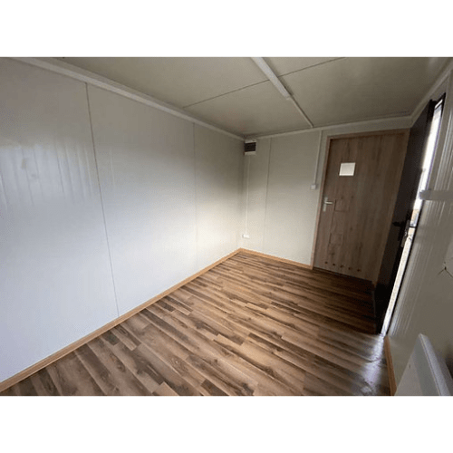 Bureau container neuf 5 × 2,20 m avec WC et sanitaires – Isolation et chauffage